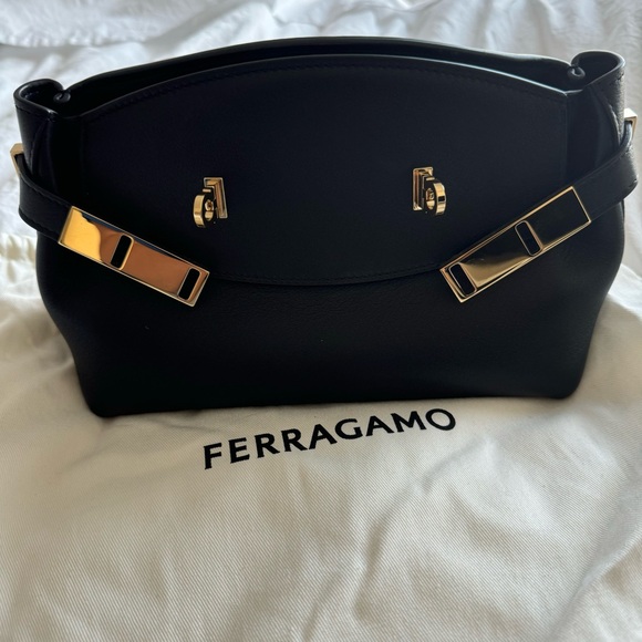 Ferragamo Hug Pouch bag in black and gold hardware - Picture 7 of 11